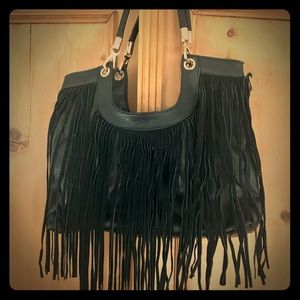 Beautiful vintage black faux leather fringe bag.